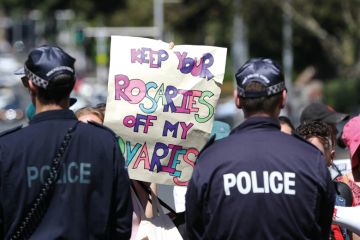 Activists held a protest against the Day of The Unborn Child at St Marys Cathedral, Sydney Activists held a protest against the Day of The Unborn Child at St Marys Cathedral, Sydney to illustrate Australian university makes A$1m pay off