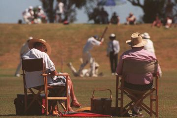 A fan is asleep during a cricket match A fan is asleep during a cricket match to illustrate Great holidays can fuel our intellectual passions