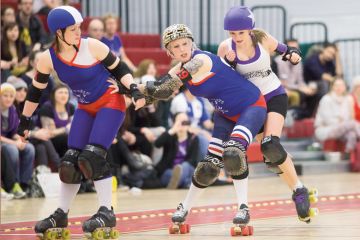 three ladies_roller skates_push_alamy.jpg