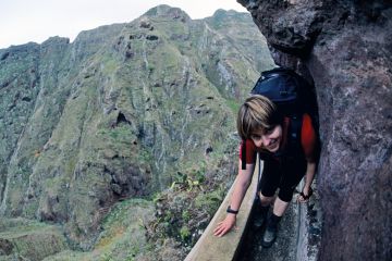 lady tight path smiling_climb_rocks getty.jpg lady tight path smiling_climb_rocks getty.jpg