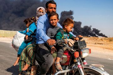 family on motorbike family on motorbike