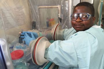 Witness Dzobo at work in Ebola treatment centre, Sierra Leone