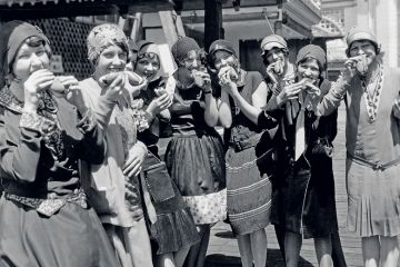 Women eating hot dogs