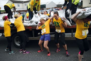 Women carrying heavy sacks