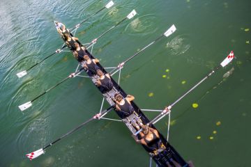 Zagreb, Croatia - September 21, 2014 Young athletes train rowing on the Lake Jarun