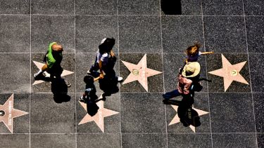 Aerial view of people on the Hollywood walk of fame
