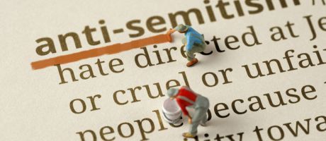 Workers underlines the word "Antisemitism" in the dictionary Workers underlines the word "Antisemitism" in the dictionary