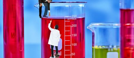 A senior manager trying to help a scientist climb up a beaker, while a young researcher also helps. The measurement scale on the beaker is like a ladder. To illustrate senior academics should use their influence to not misuse metrics.