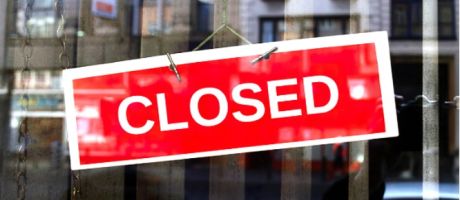 A closed sign on a door A closed sign on a door
