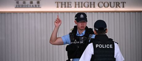 Hong Kong police outside the territory's High Court Hong Kong police outside the territory's High Court