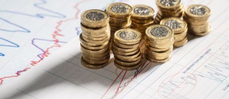 Pound coins in piles