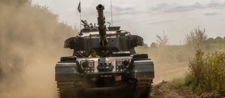 Close up of an army tank on a military training session.