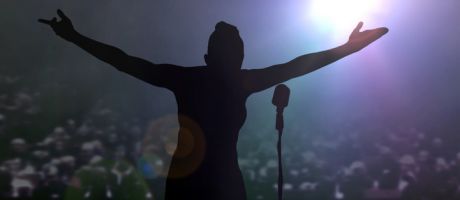 Women bowing on stage