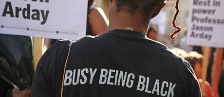 An attendee, wearing a T-shirt stating “busy being black”, holds a placard during a vigil for former Cambridge professor Jason Arday in Trafalgar Square on 17 August 2026 in London, United Kingdom. An attendee, wearing a T-shirt stating “busy being black”, holds a placard during a vigil for former Cambridge professor Jason Arday in Trafalgar Square on 17 August 2026 in London, United Kingdom.