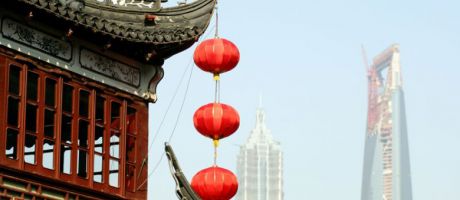 Red lanterns hanging from a temple roof in Shanghai