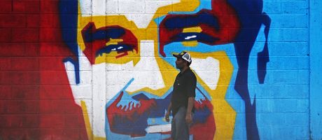 A man walks past a mural depicting Venezuelan President Nicolas Maduro in Caracas on January 3, 2026.