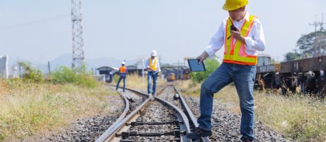 Railway engineers inspect a junction, symbolising university bureaucracy
