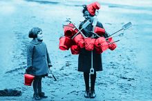 A young girl with one bucket looks at a girl carrying many buckets. To illustrate the question of whether the bucket model of UKRI funding will succeed.
