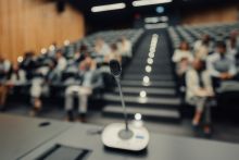 A microphone in a lecture theatre A microphone in a lecture theatre