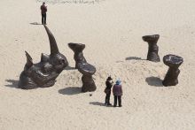 People near the Buried Rhino sculpture by artists Gillie and Marc Schattner, exhibited along the coastal walk between Bondi and Tamarama Beaches, Australia. To illustrate that universities should stop ignoring the African HE boom. People near the Buried Rhino sculpture by artists Gillie and Marc Schattner, exhibited along the coastal walk between Bondi and Tamarama Beaches, Australia. To illustrate that universities should stop ignoring the African HE boom.