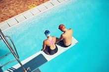 Two swimmers sitting on a diving board above a swimming pool. To illustrate that intervening to to help students avoid struggle can deny them the opportunity to advocate for themselves. Two swimmers sitting on a diving board above a swimming pool. To illustrate that intervening to to help students avoid struggle can deny them the opportunity to advocate for themselves.