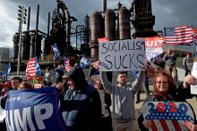 Donald Trump supporters demonstrate at SteelStacks on 15 April 2019 in Bethlehem, Pennsylvania. One person holds a sign stating “socialism sucks”. To illustrate the rise of right-wing populism.
