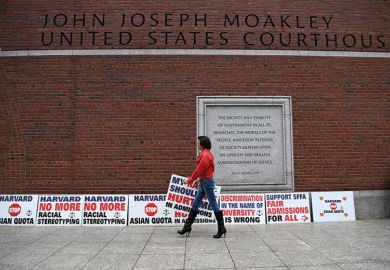 woman-walking-past-signs woman-walking-past-signs