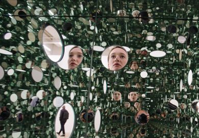 Face repeated in series of mirrors