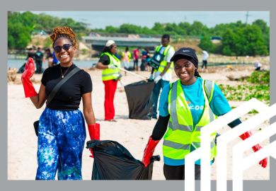 Two women participating in a beach clean-up in Africa, organised by the All-Africa Students Union (AASU). Two women participating in a beach clean-up in Africa, organised by the All-Africa Students Union (AASU).