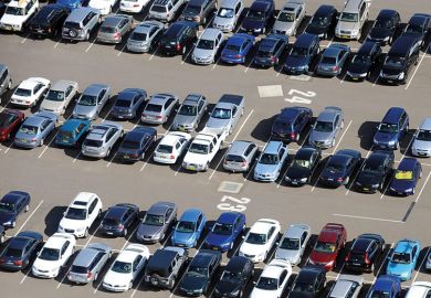 Aerial view of cars parked in airport long term parking