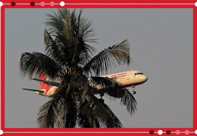 An Air India passenger flight prepares for landing at the Biju Patnaik International Airport seen behind a tree, illustrating branch campuses in India.  An Air India passenger flight prepares for landing at the Biju Patnaik International Airport seen behind a tree, illustrating branch campuses in India.
