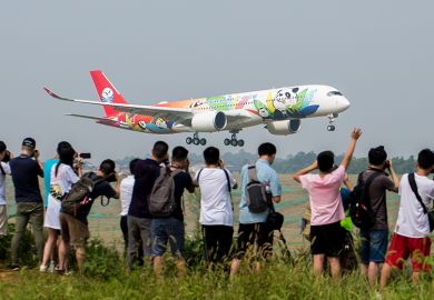 Spectators take photos of Sichuan Airlines’ panda-themed Airbus A350-900 upon its arrival at Chengdu Shuangliu International Airport, China. To illustrate whether the sky is the limit for Asian international student recruitment.
