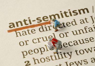 Workers underlines the word "Antisemitism" in the dictionary Workers underlines the word "Antisemitism" in the dictionary