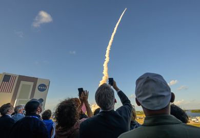 Guests watch the launch of NASA’s Space Launch System rocket carrying the Orion spacecraft with astronauts for NASA’s Artemis II mission, Wednesday, 1 April, 2026.