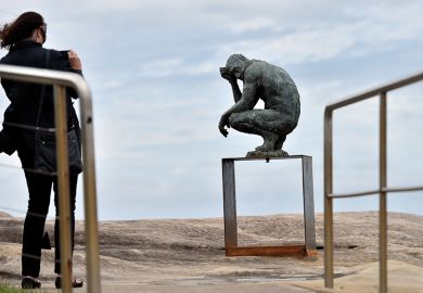 A visitor takes a picture of a sculpture by British artist Laurence Edwards at the “Sculpture by the Sea” exhibition that runs along the Bondi to Tamarama coastal walk in Sydney, 22 October 2015 A visitor takes a picture of a sculpture by British artist Laurence Edwards at the “Sculpture by the Sea” exhibition that runs along the Bondi to Tamarama coastal walk in Sydney, 22 October 2015