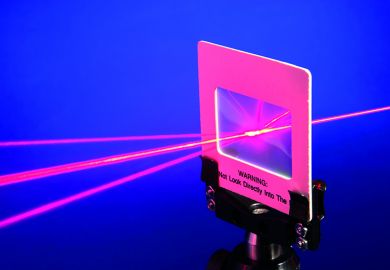 Red laser beam split by a diffraction grating