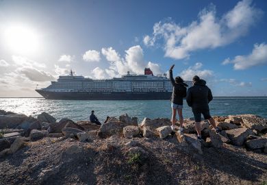 People waving off a luxury cruise ship as it leaves Adelaide, Australia. To illustrate the growing divide between rich universities and poorer ones.
