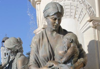 Breastfeeding baby sculpture