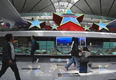 Passengers are seen at the Beijing Daxing International Airport in China's capital city. To illustrate the growing exodus of Chinese academics from US.