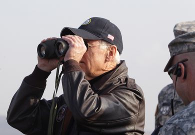 Joe Biden looks through binoculars toward North Korea Joe Biden looks through binoculars toward North Korea