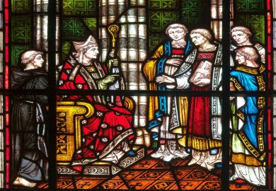 Bishop Grosseteste in the Norman built cathedral at Lincoln, England: stained glass window in the chapter house of the cathedral. Lincoln Bishop university was formerly named Bishop Grosseteste University.