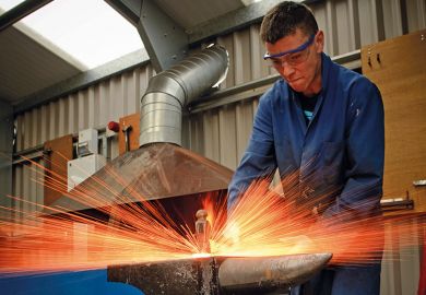 Blacksmith hitting anvil