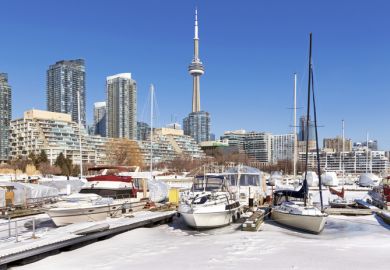 Boats at Toronto Harbourfront marina in winter