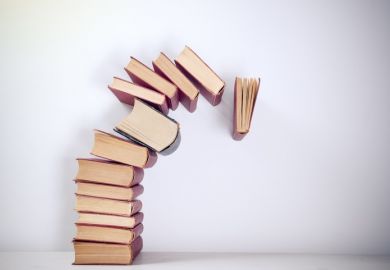 Books Pile of books falling over