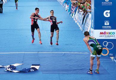 Brownlee crossing the finish line