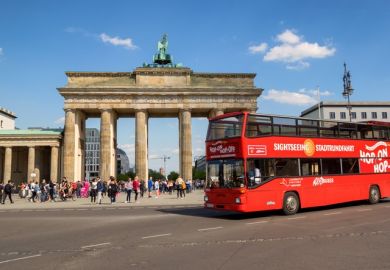 A double-decker bus at the Brandenburg Gate