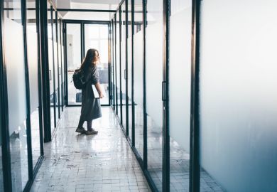 Business woman leaving office