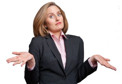 Businesswoman shrugging