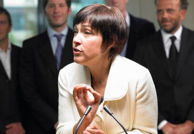 Businesswoman speaking at conference