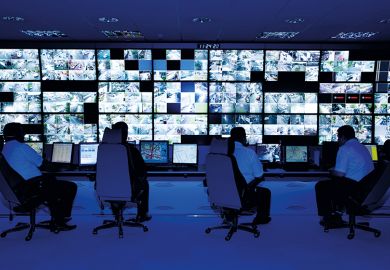 Control room with CCTV camera footage on screens